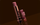 Lip color products displayed on a brown background