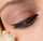 Close-up view of eye makeup and eyeliner application