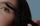 Model applying mascara
