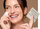 Model holding Skincare Sample