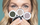 Lip color products displayed on a brown background