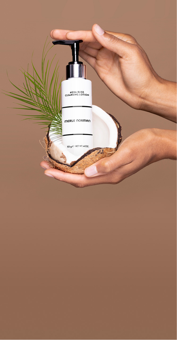 Woman holding Aqua Bliss Cleansing Lotion